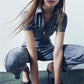 Combinaison zippée en denim avec manches courtes et poches pour femmes