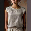 Blouse femme sans manches avec bordure en dentelle